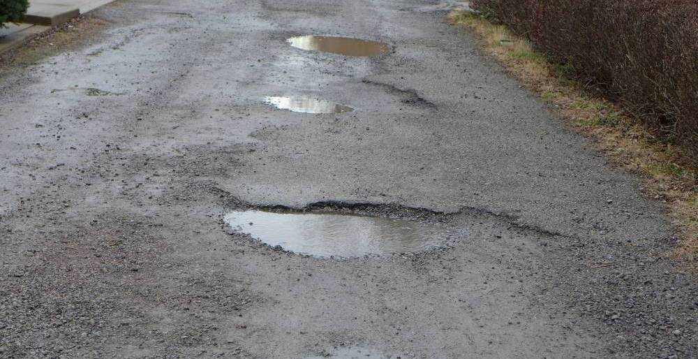 Potholes in Greenfield, Feb 2016 (photo by Kate St. John)