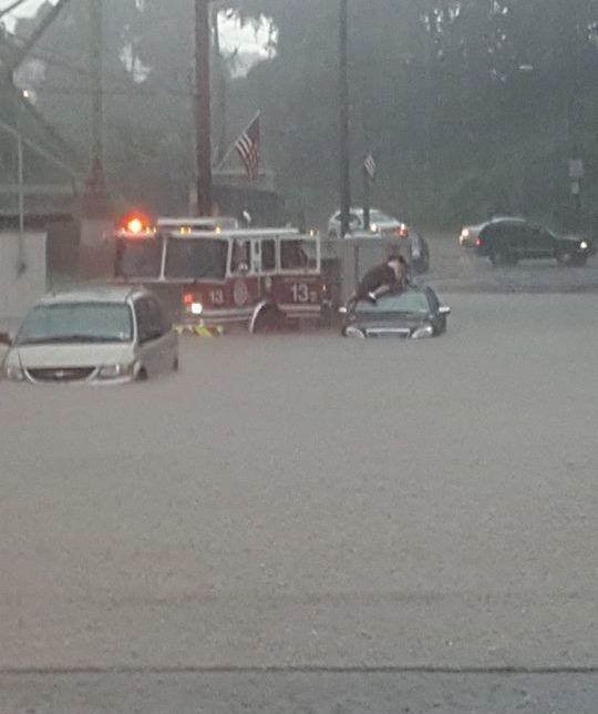 Firetruck arrives to rescue stranded father and son during flash flood in The Run, 28 Aug 2016 (photo by Justin Macey)